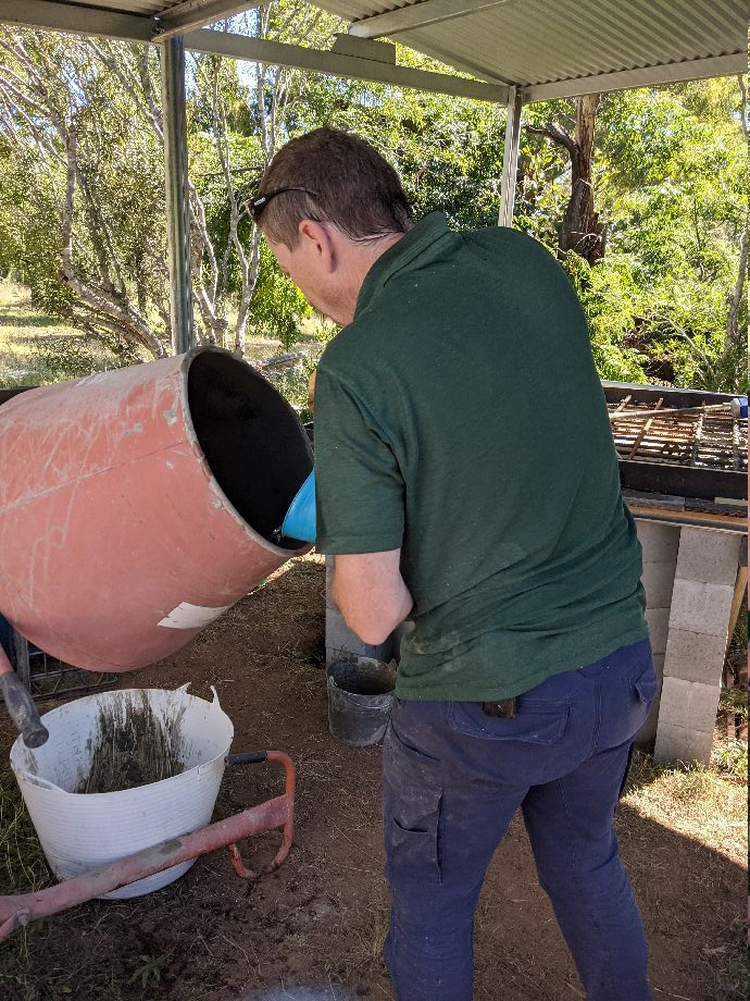 2021-04-13-jedd-mixing-cement.jpg